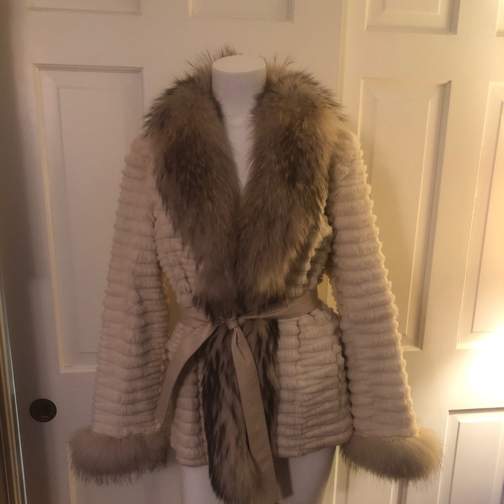 Custom designed cream colored belted fur coat